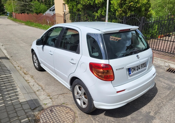 Suzuki SX4 cena 32500 przebieg: 158000, rok produkcji 2012 z Rzeszów małe 154